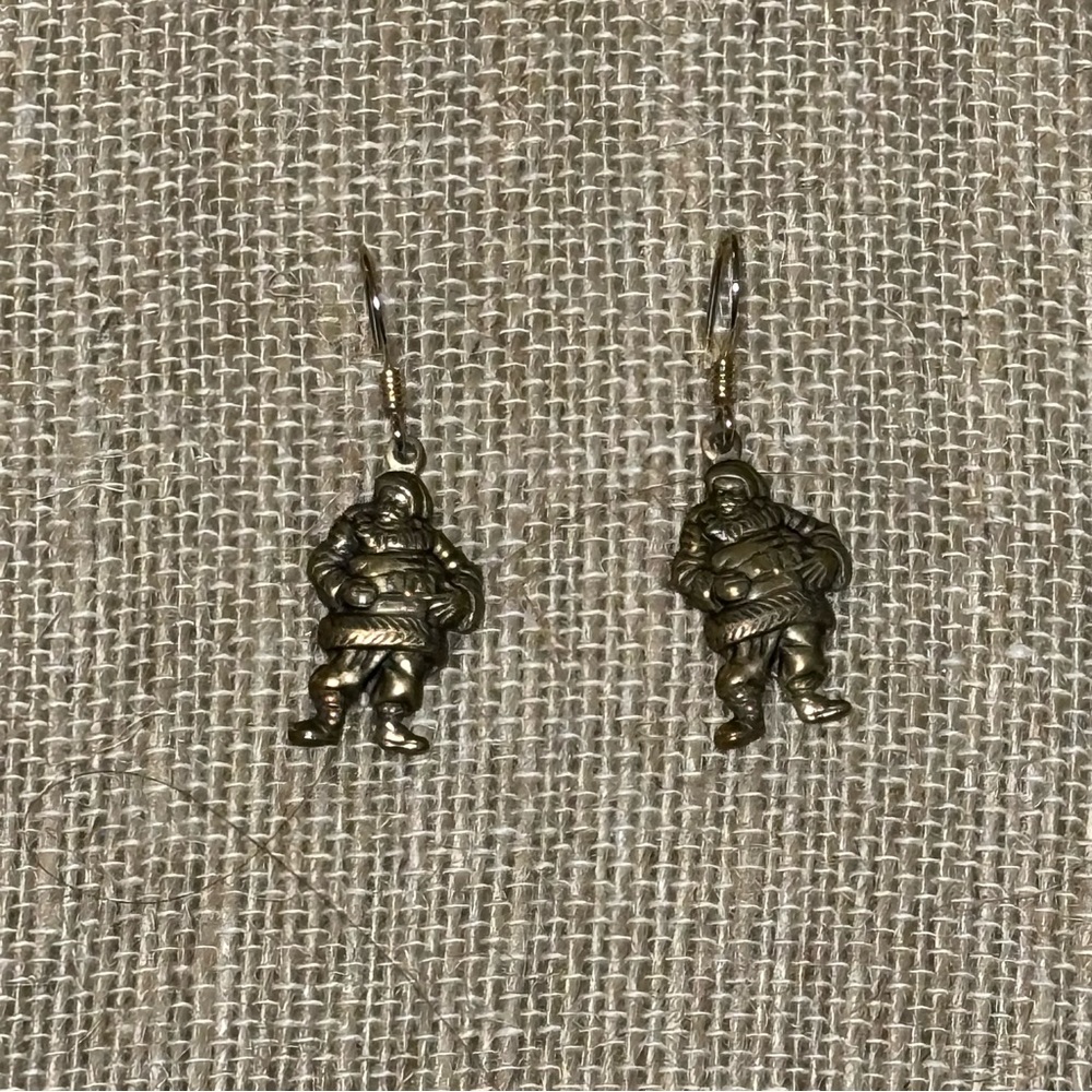 Santa Claus Holiday brass toned dangle pierced earrings.